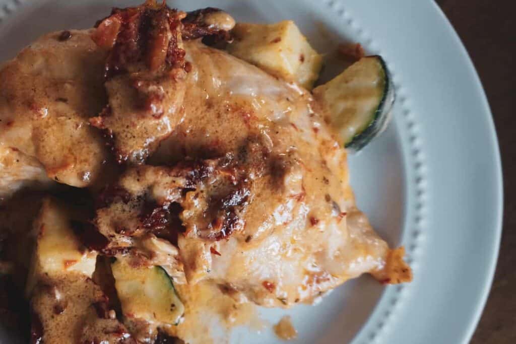 Creamy Tuscan Chicken Casserole with sun-dried tomatoes and zucchini