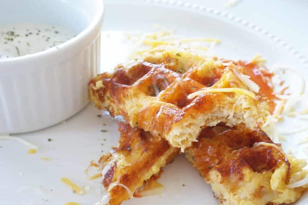 crisp buffalo chicken made in the mini waffle maker with cheese and egg
