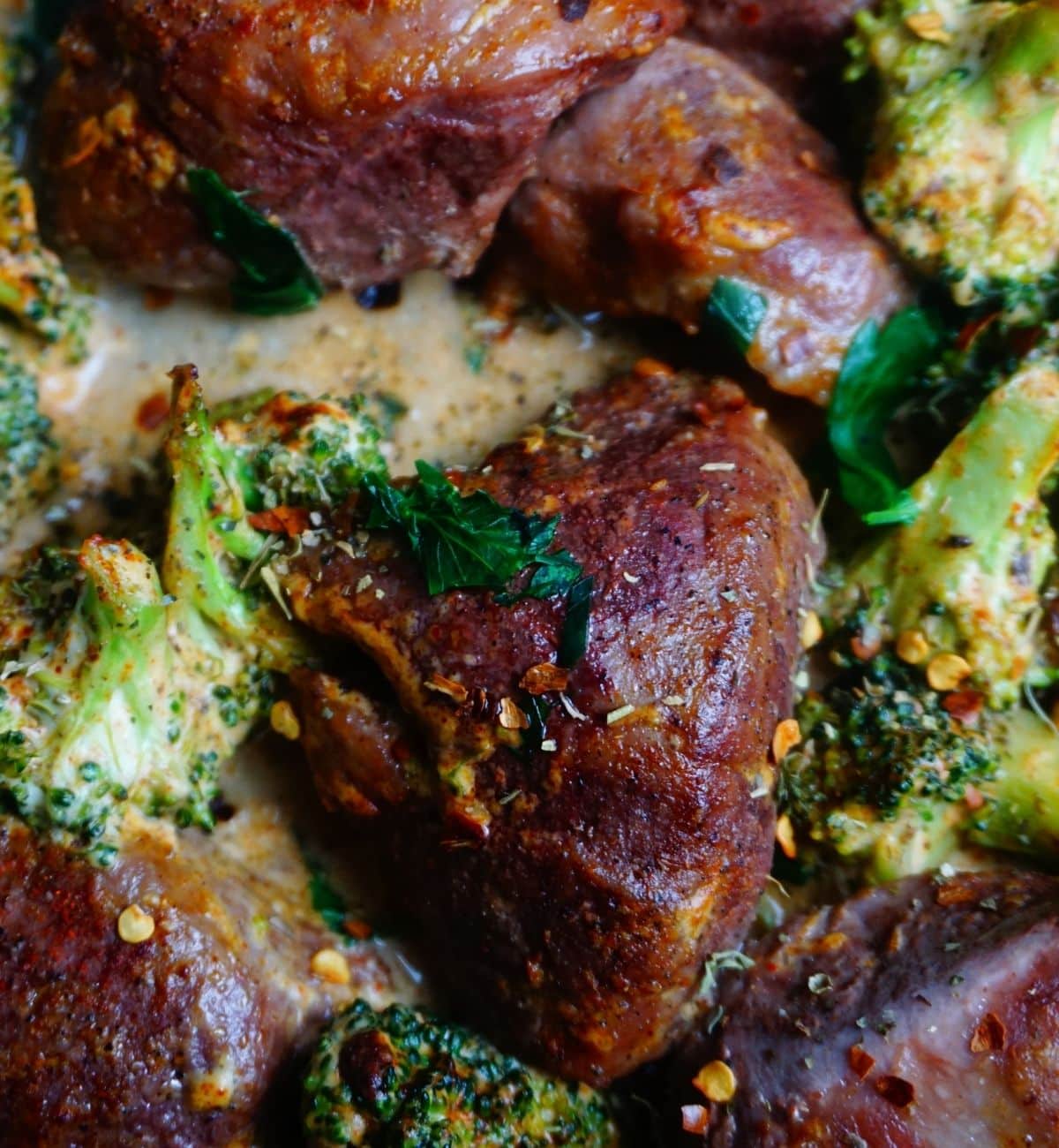 spicy pork and broccoli in a cast iron skillet