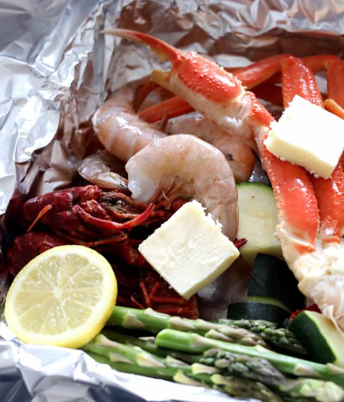 foil with seafood veggies and butter