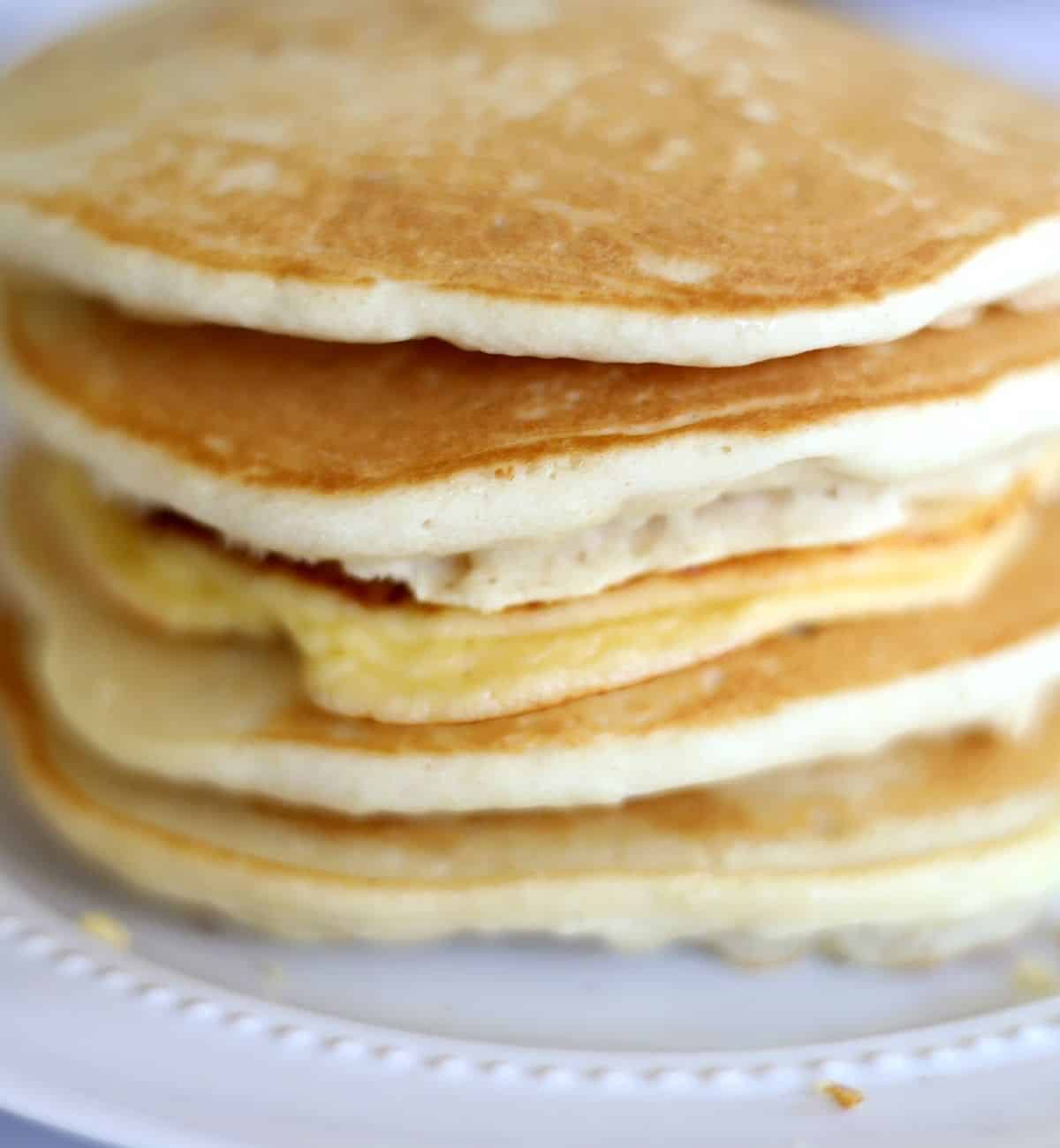 stack of keto cinnamon roll pancakes