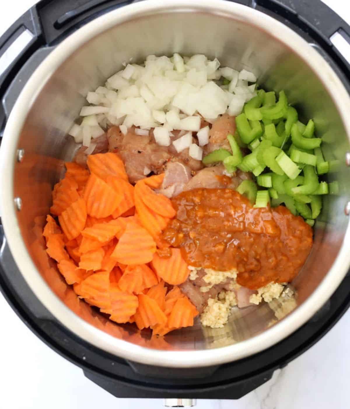 instant pot with turkey onion celery carrots