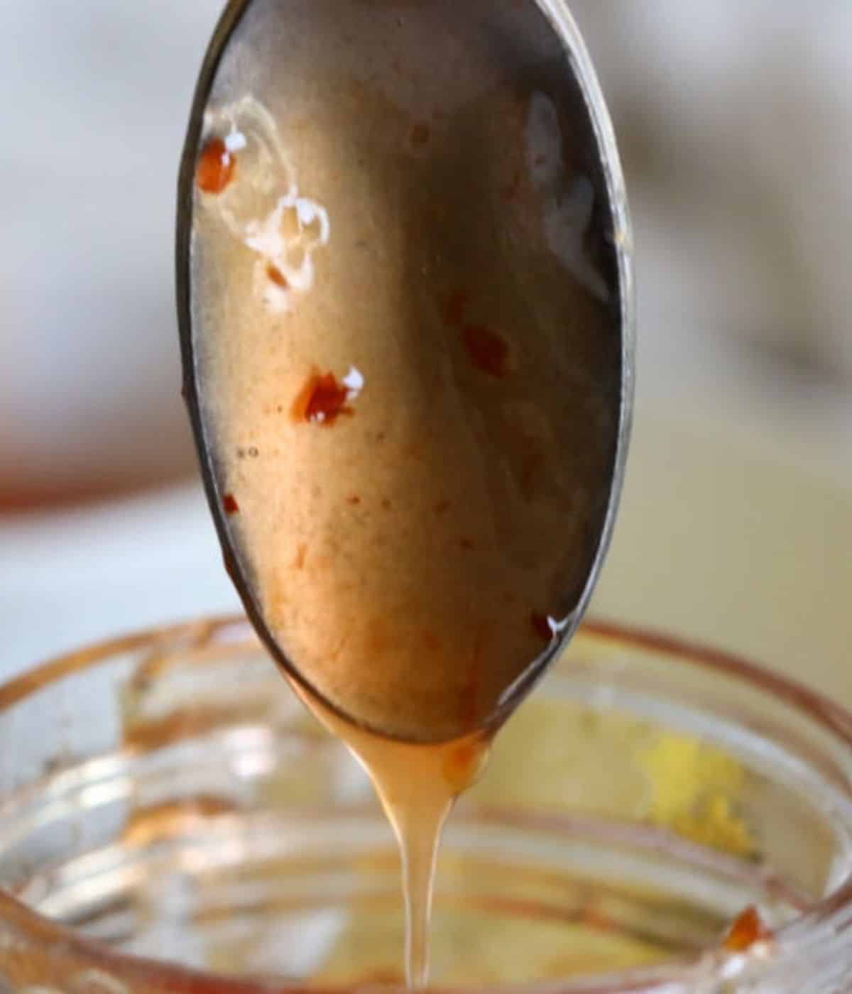 sweet chili sauce on a spoon