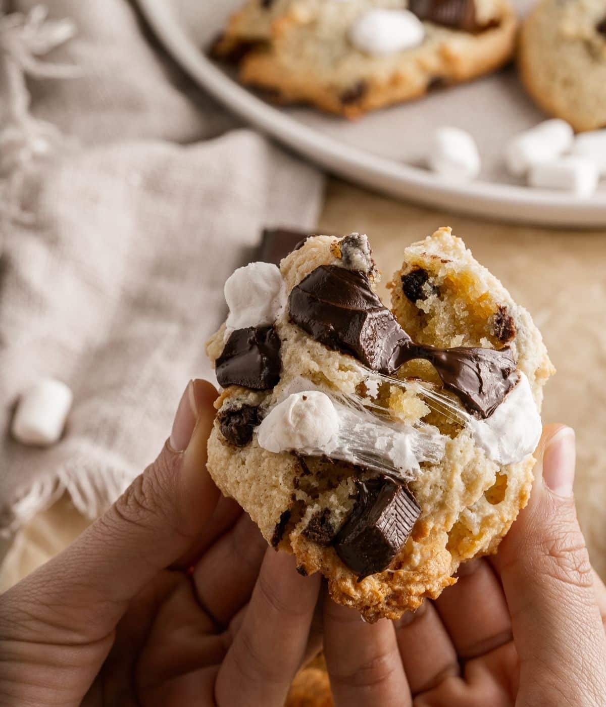 breaking apart chewy marshmallow smores cookie