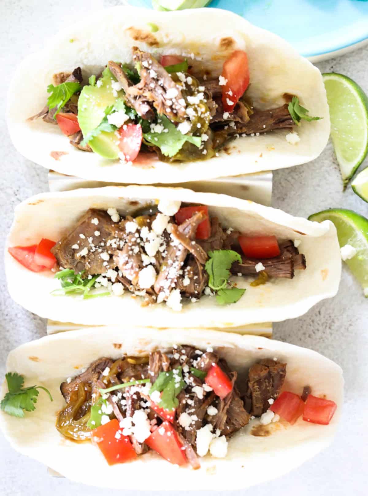 carne asada tacos with cojita cheese