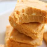 keto pumpkin fudge with a bite taken out and stacked together