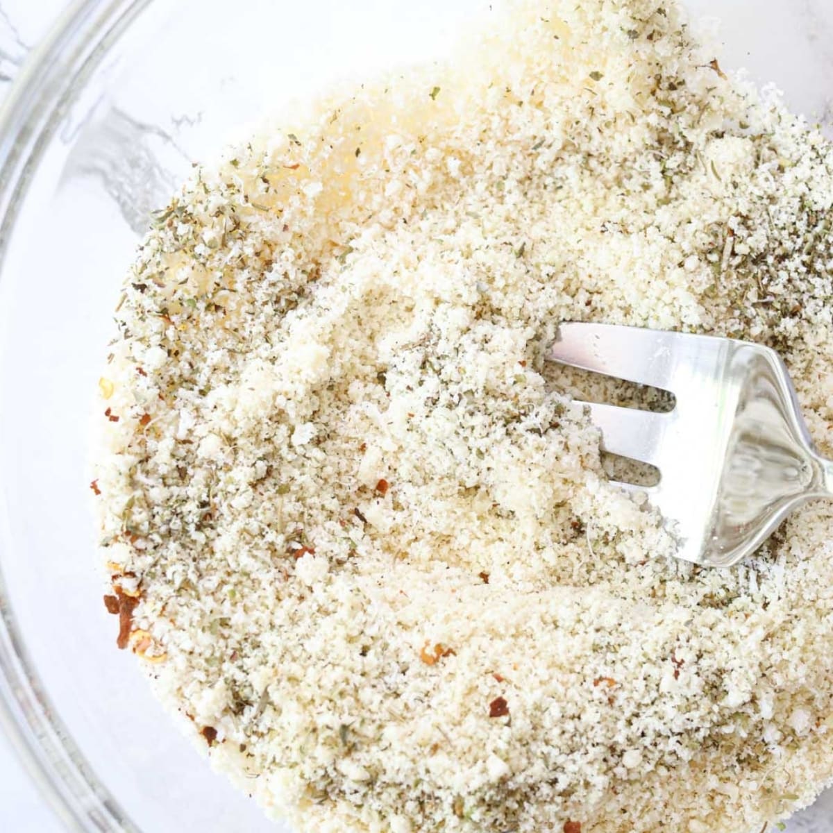 keto breadcrumbs in a bowl with a fork