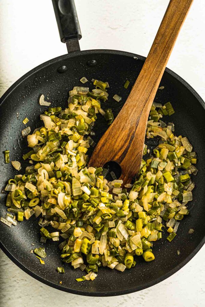 sautéing veggies in a pan