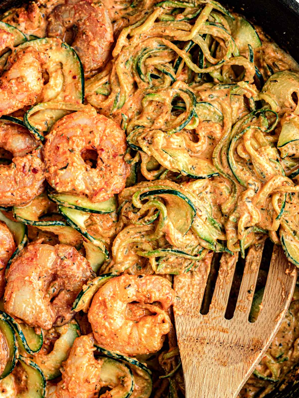 close up of shrimp with creamy zucchini and spices