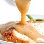 air fryer turkey slices with gravy being poured on top