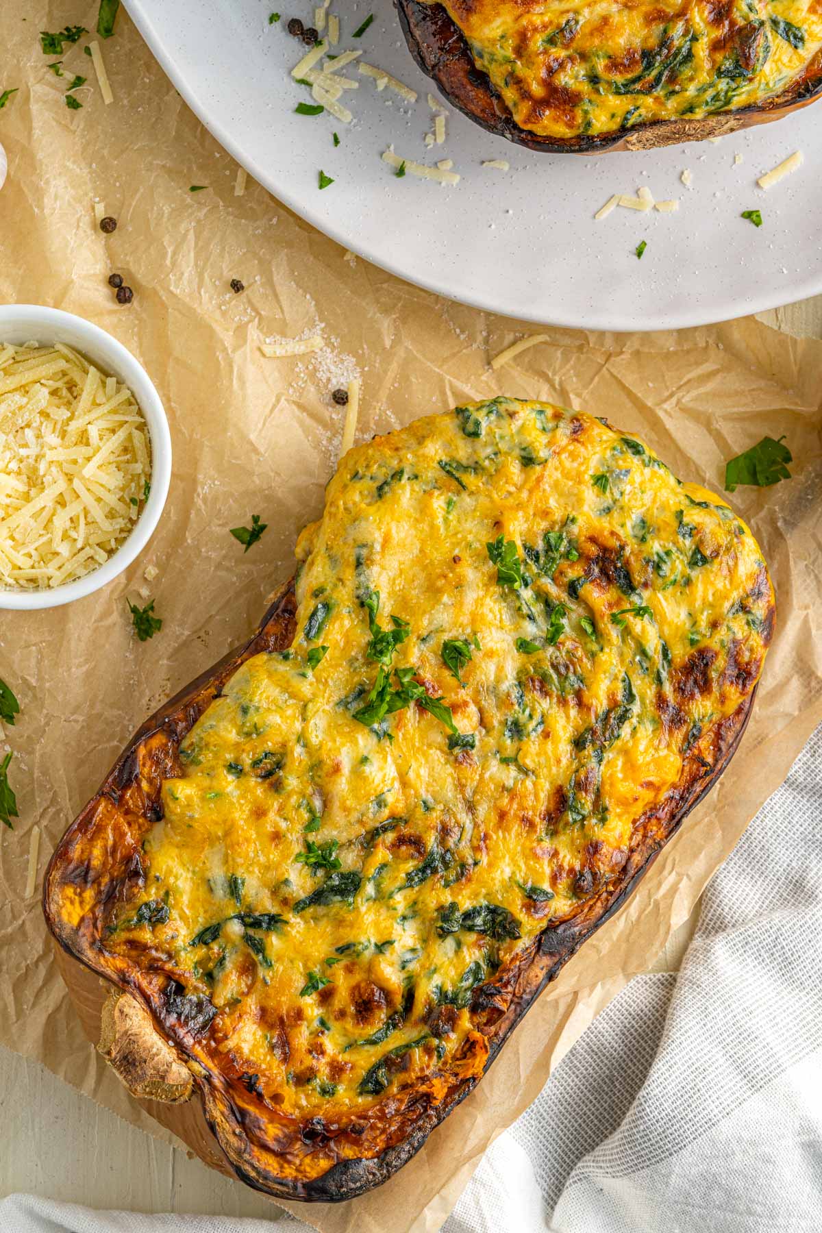butternut squash with cheese topping baked to a golden texture