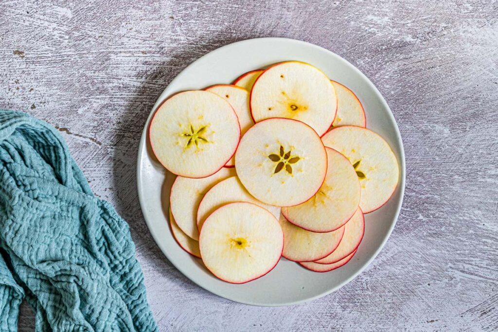thin apple slices on a plate