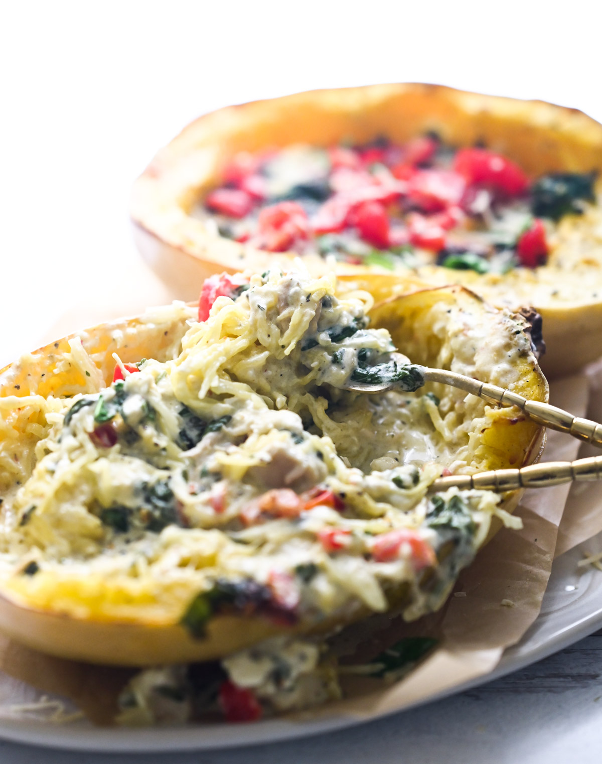 creamy squash with spinach and tomatoes