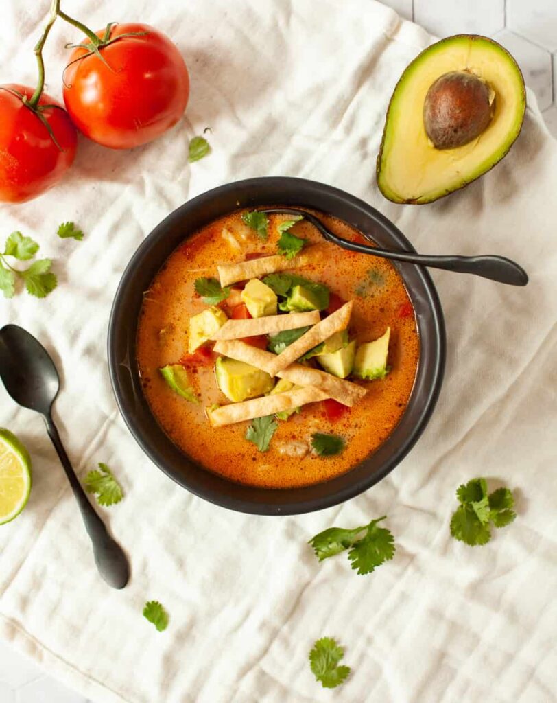 keto chicken tortilla soup with cilantro garnish