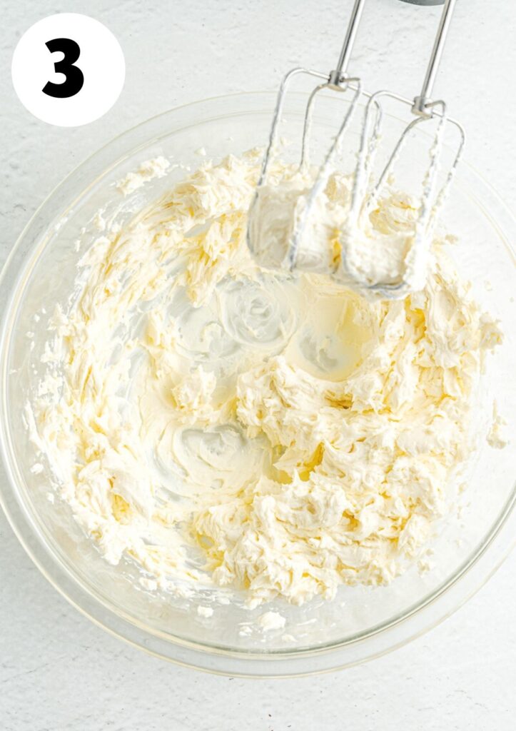 whipping cream cheese in a bowl