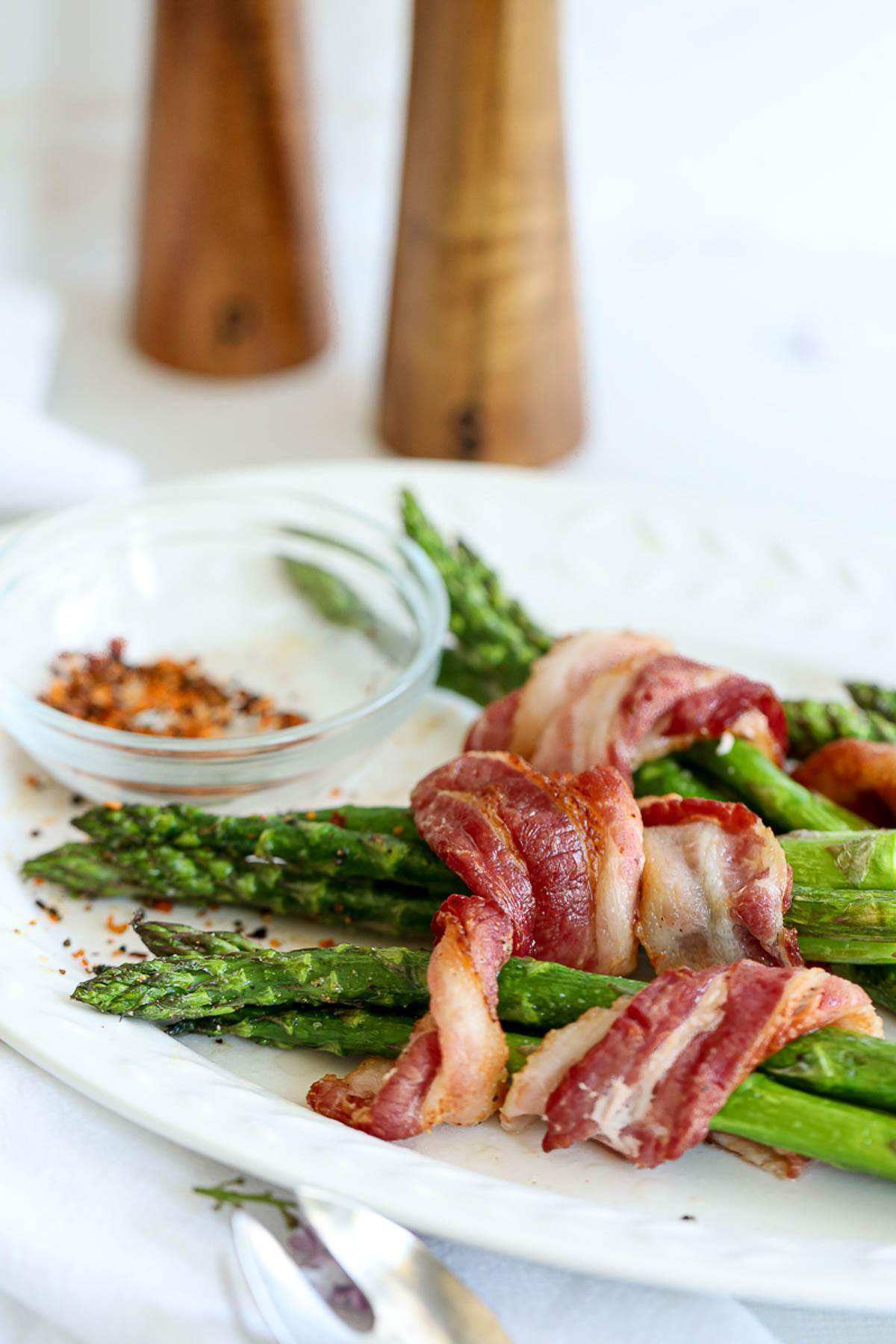 asparagus bundles wrapped in crisp bacon