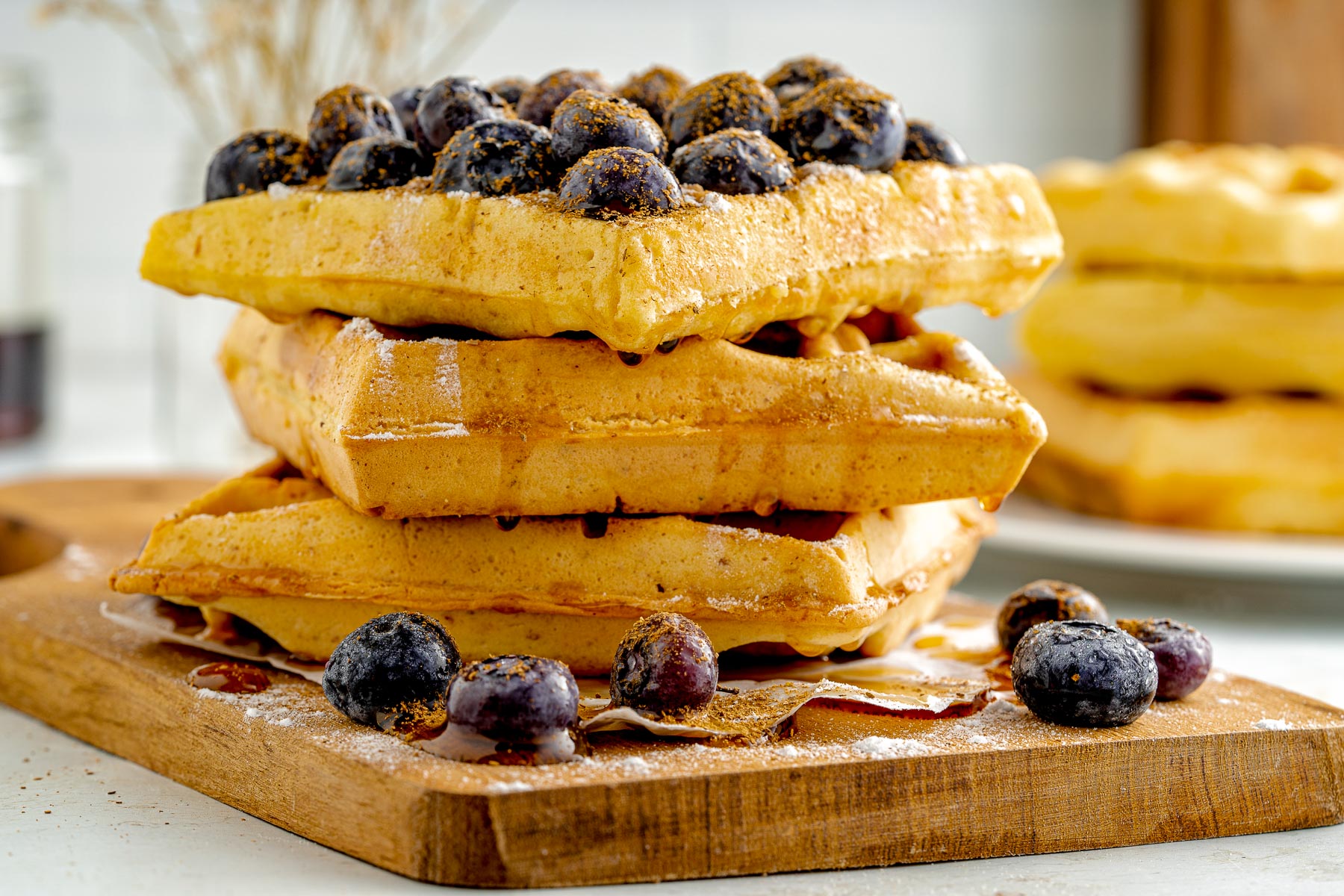 stack of waffles on a cutting board